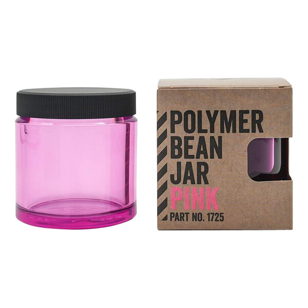 A pink plastic Comandante bean jar with a black lid.