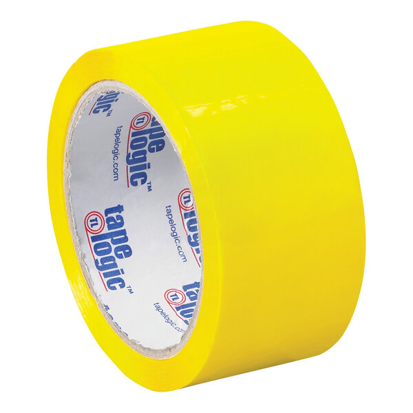 A roll of yellow Tape Logic carton sealing tape with white writing on it.
