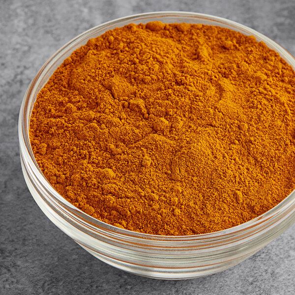 A bowl of Hometown Provisions ground turmeric powder.