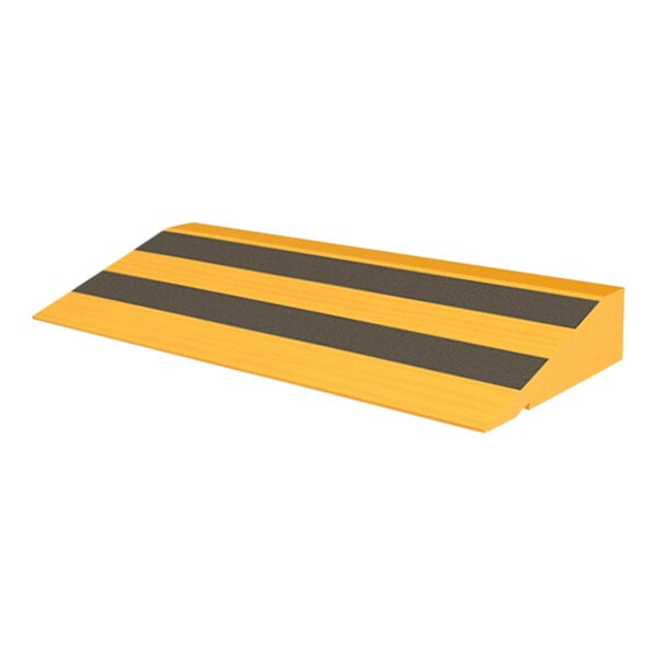 A wood ramp with yellow and black stripes on the top surface.