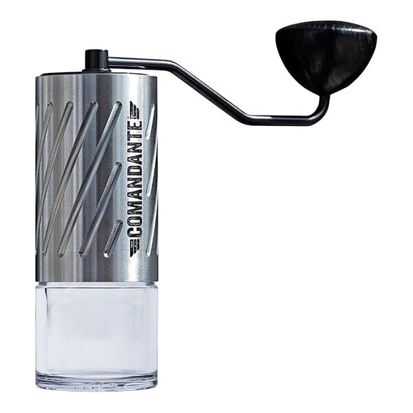 A close-up of a stainless steel Comandante coffee grinder with a glass lid.