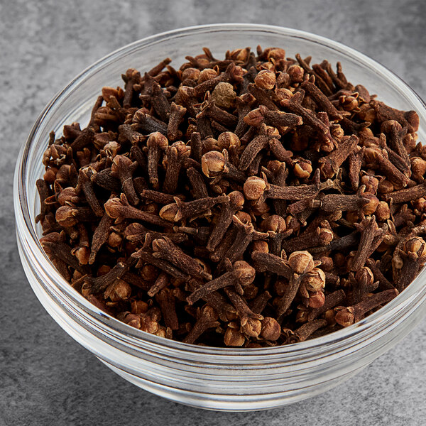 A bowl of Hometown Provisions whole cloves.