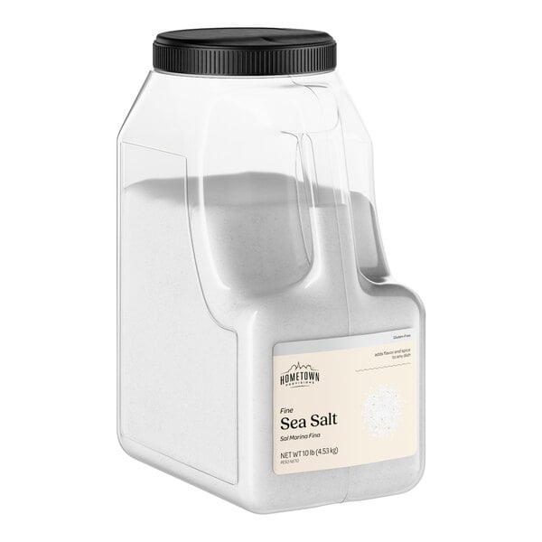 A large plastic container of Hometown Provisions Fine Sea Salt weighing 10 pounds.