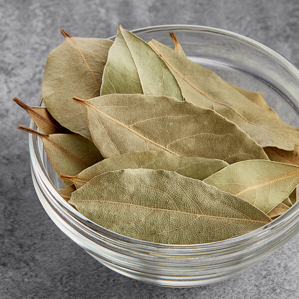 A bowl of Hometown Provisions dried bay leaves.