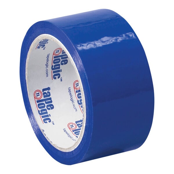 A close-up of a roll of blue Tape Logic carton sealing tape with white writing on it.