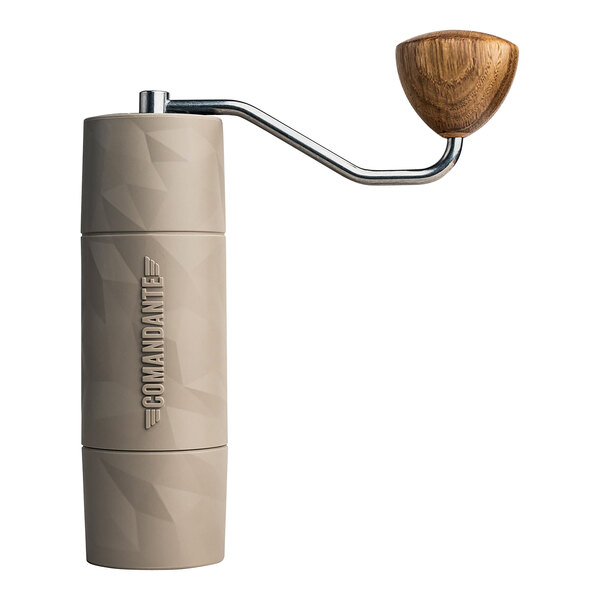 A Comandante coffee grinder with a wooden handle.