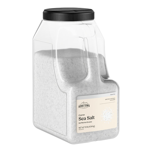 A large plastic container of Hometown Provisions coarse sea salt.