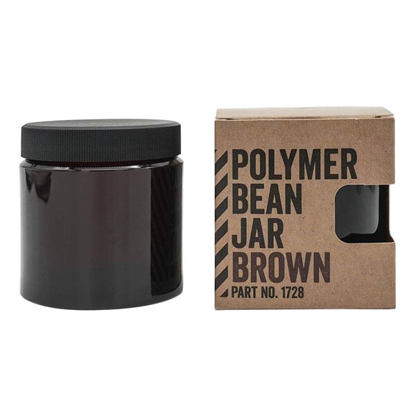 A brown Comandante polybean jar with black lid.