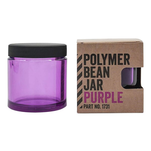 A purple Comandante jar with a black lid.
