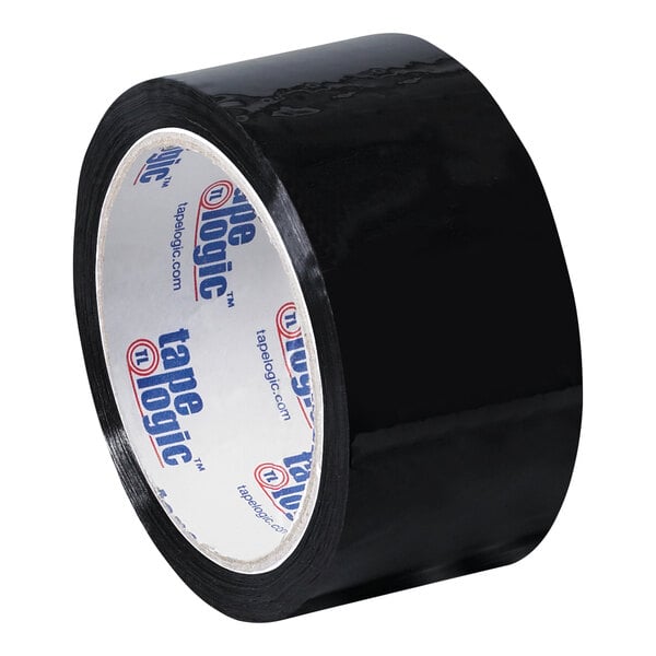 A close-up of a roll of black Tape Logic carton sealing tape with white writing on it.