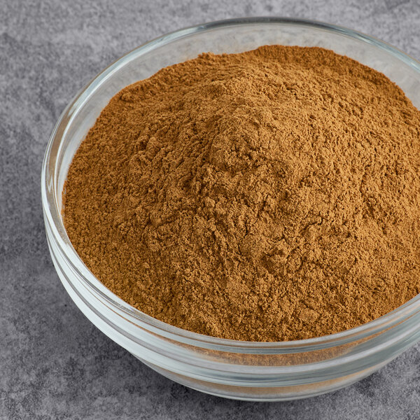 A bowl of Hometown Provisions ground cinnamon powder.