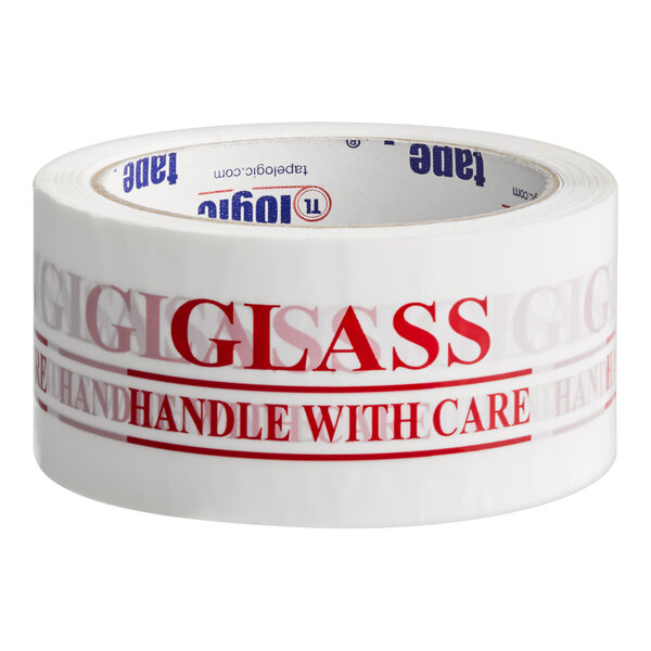 A white roll of Tape Logic carton sealer tape with red text that reads "Glass Handle With Care"