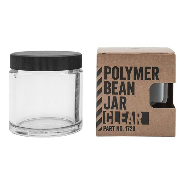 A clear Comandante bean jar with a black lid and a box.