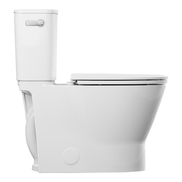 An American Standard white floor mount toilet with the seat down.