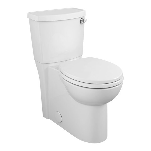 An American Standard white floor mount toilet with the seat down.