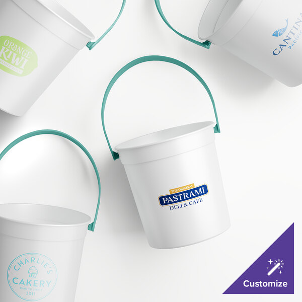 A group of white Howw Manufacturing plastic drink buckets with teal handles.