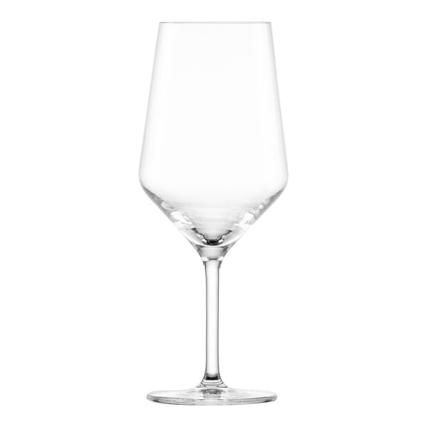 A close-up of a clear Schott Zwiesel red wine glass with a stem.