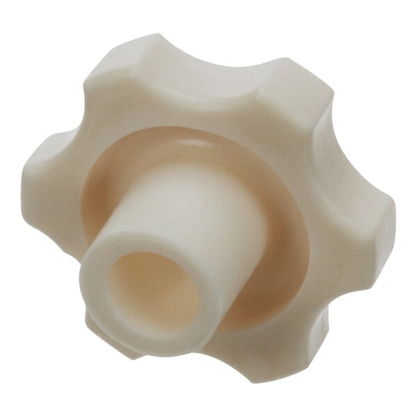 A close-up of a white plastic Hobart knob.