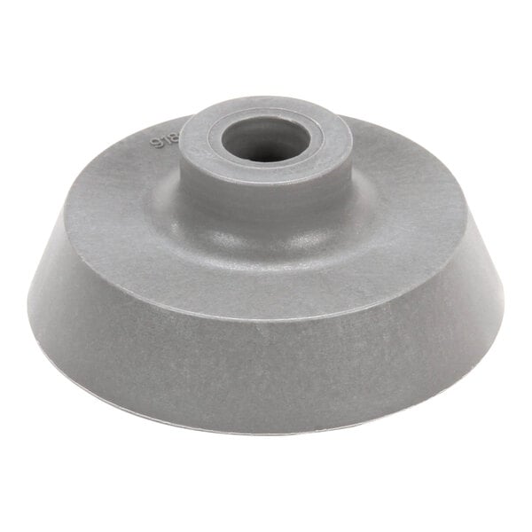 A grey round plastic bearing deflector with a hole.