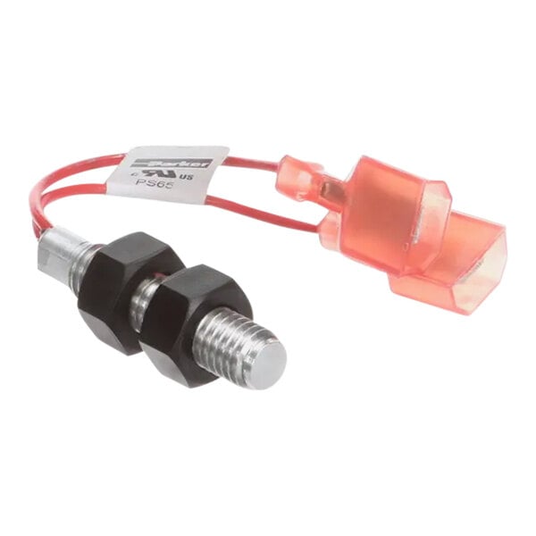 A red and black wire with a red connector plugged into a Hobart reed switch.