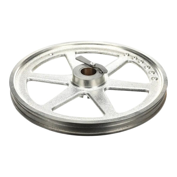 A metal Hobart saw pulley wheel with a hole in the center.
