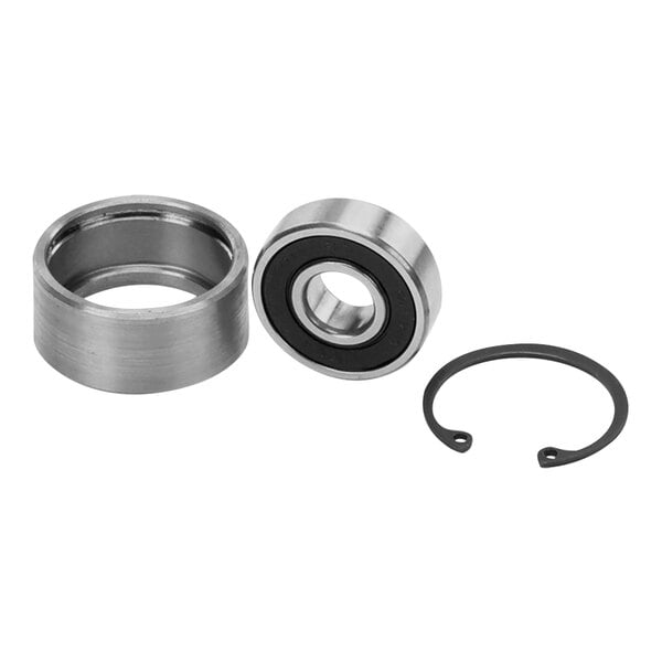 A close-up of a Hobart belt tightener bearing kit, including a metal ring.