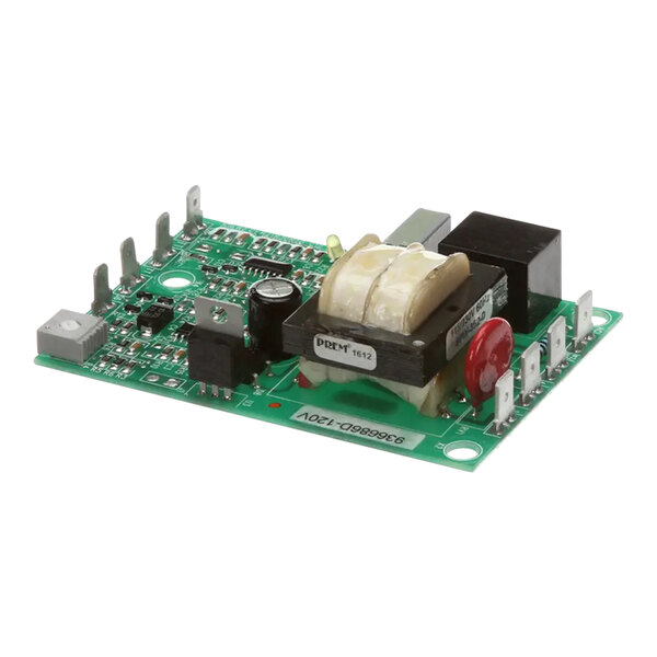 A green circuit board with many small components.