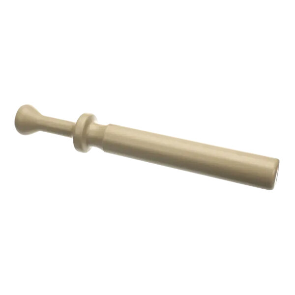 A white object with a long handle.