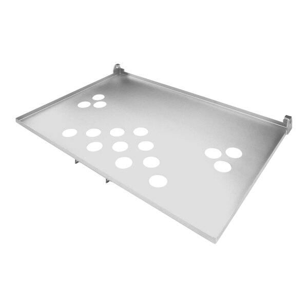 A silver metal plate with holes.