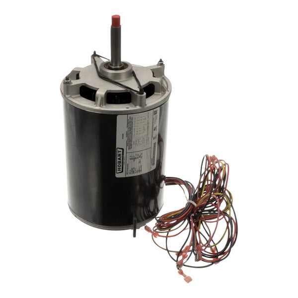 A close-up of a black and silver Hobart HL300 motor with wires attached.