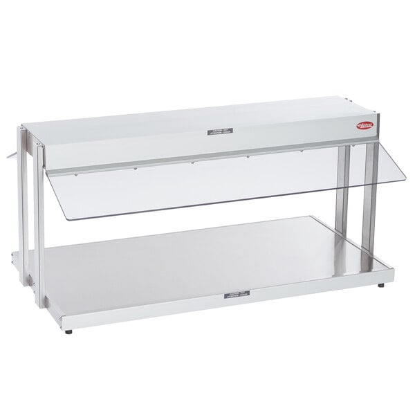 A white rectangular shelf with a white surface and a stainless steel top.