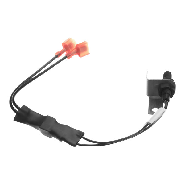 A Hobart reed switch with black and orange wires.