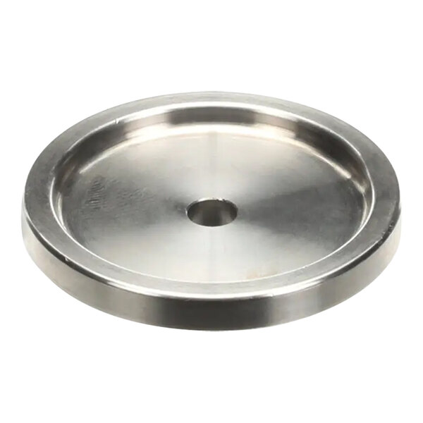 A silver circular Hobart truing wheel with a hole in the center.