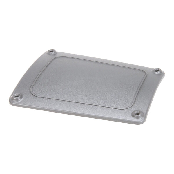 A grey plastic rectangular cover with a metal plate on top.