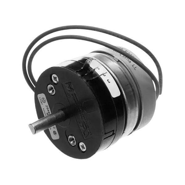 A black round electric motor with wires.