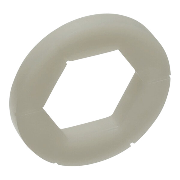 A white plastic ring with a hexagon shape.