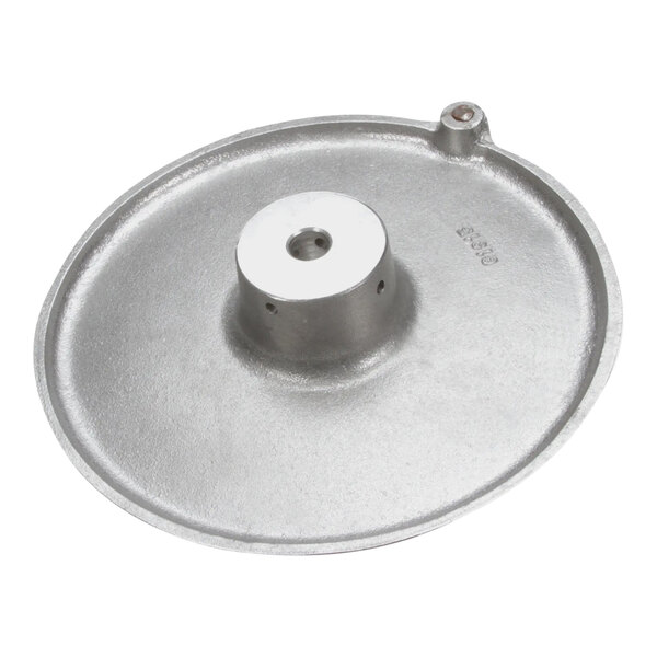 A close-up of a Hobart handwheel assembly, a round metal object with a hole in the center.