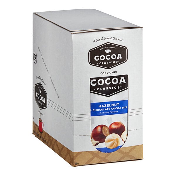 A box of Cocoa Classics Hazelnut and Chocolate Cocoa Mix packets on a white background.
