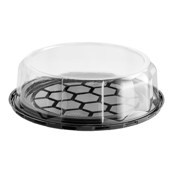A clear plastic D&W Fine Pack cake display container with a clear scalloped dome lid.