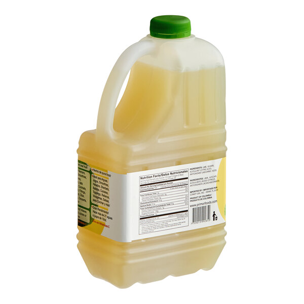 A large plastic jug of Primor lime puree with a green cap and labeled nutritional information.