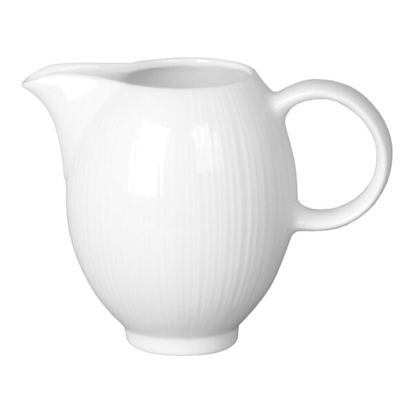 A Steelite white handled jug with a close-up of the handle.