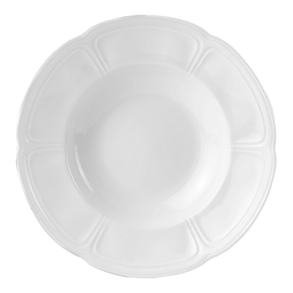 A white Steelite bowl with a scalloped rim.