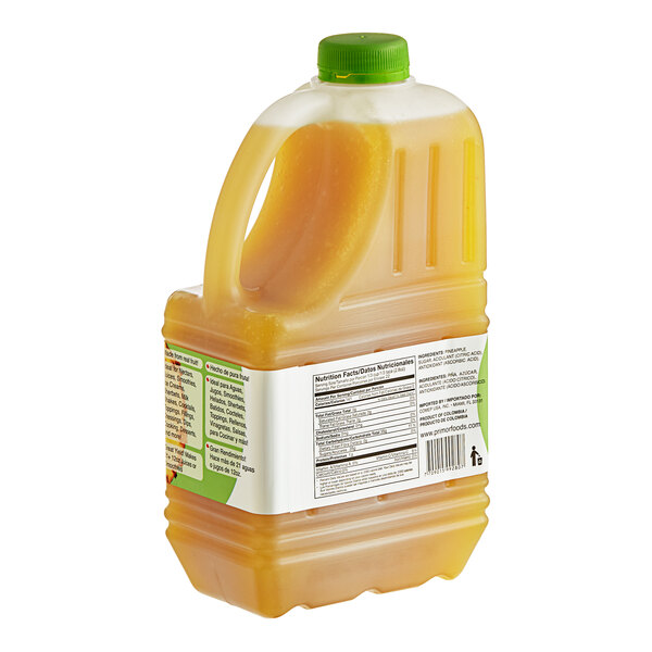A jug of Primor Pineapple Puree with a green cap.