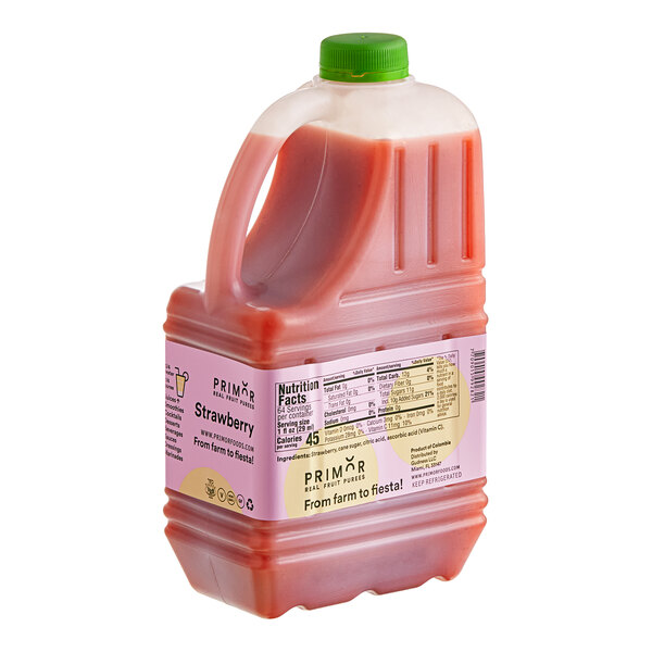 A Primor jug of strawberry puree juice.