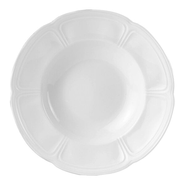 A Steelite white bowl with a scalloped rim.