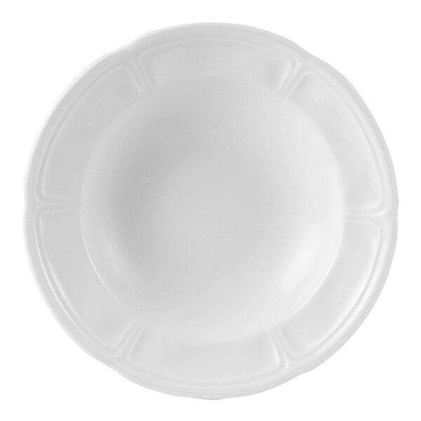 A white Steelite soup bowl with a scalloped rim.