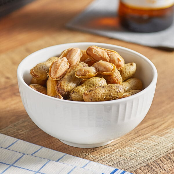 A bowl of Peanut Patch boiled peanuts on a table.