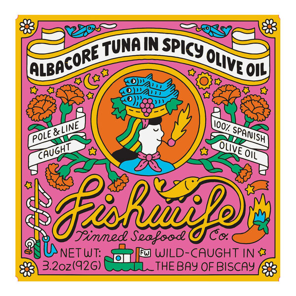 A Fishwife Albacore Tuna can with a colorful label reading "Albacore Tuna in Spicy Olive Oil"