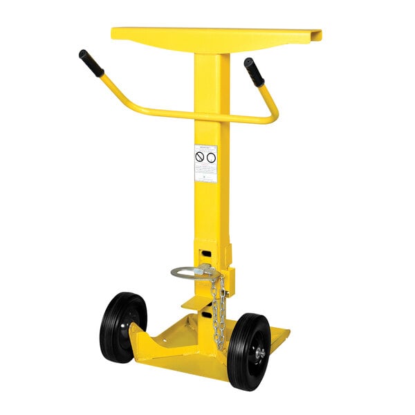 A yellow Ideal Warehouse AutoStand trailer stand with a handle.