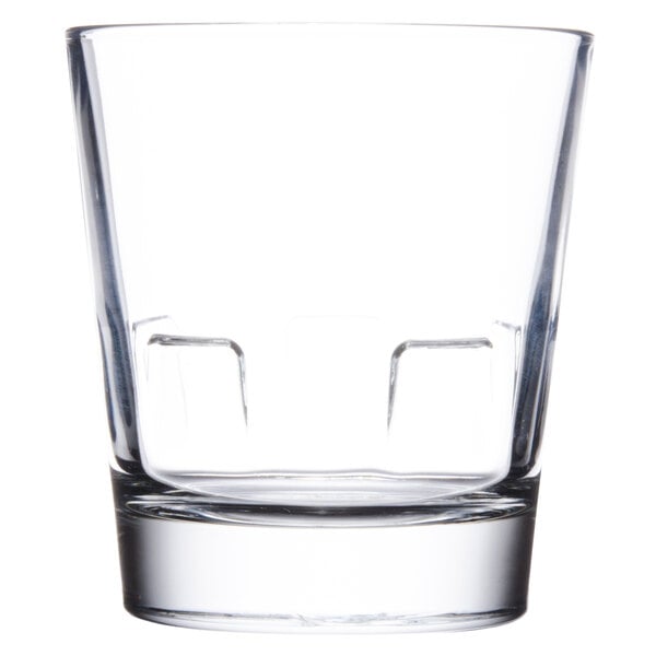 A close up of a clear Libbey Optiva stackable rocks glass.
